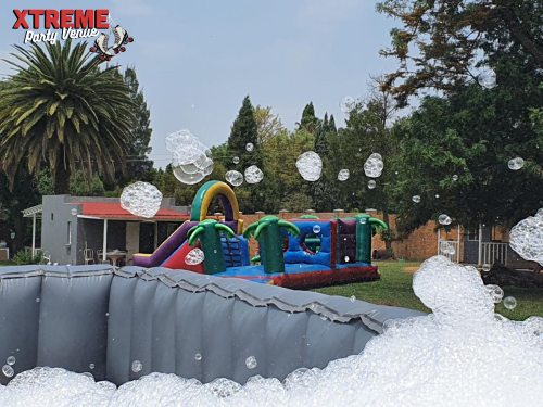 Foam pit with bubbles and inflatables
